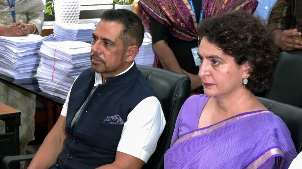 BJP taunts Priyanka over Robert Vadra’s asset declaration, likening him to ‘crime master Gogo’ amid SUV, farmhouse claims.