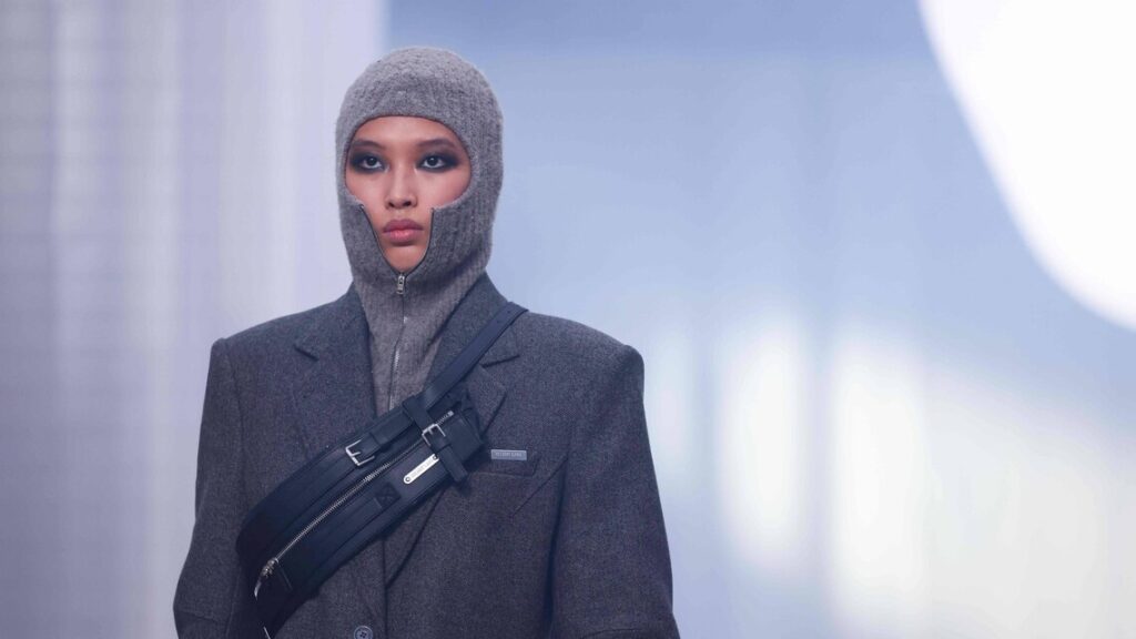 Helmut Lang showcases unique designs at New York Fashion Week, featuring bubble wrap and balaclavas.